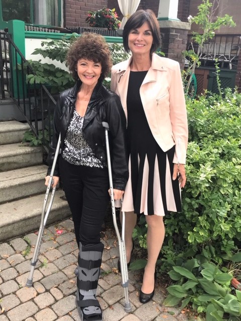 on crutches and dressed up for TIFF